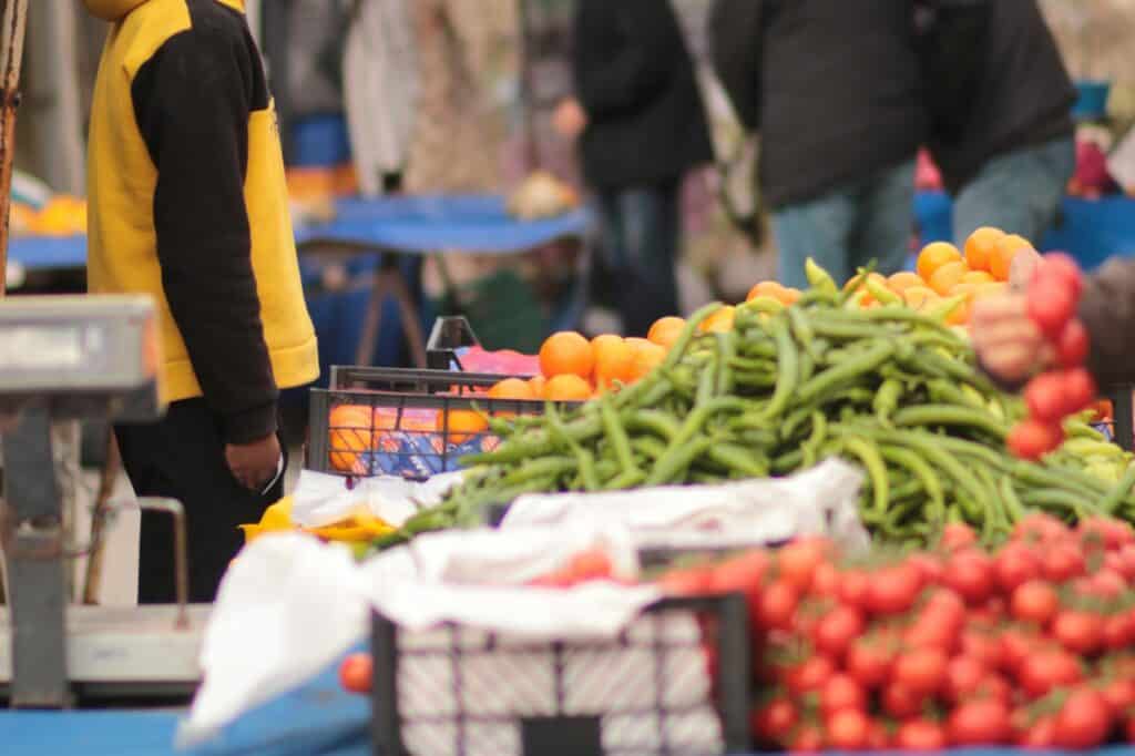 Fresh produce at a farmers' market in the concept of 'best local shops and markets in Ealing'.